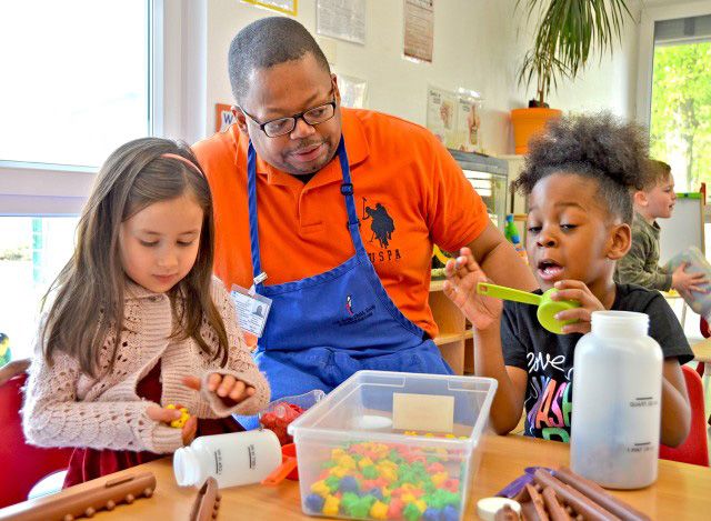 Kids Kids doing a science experiment